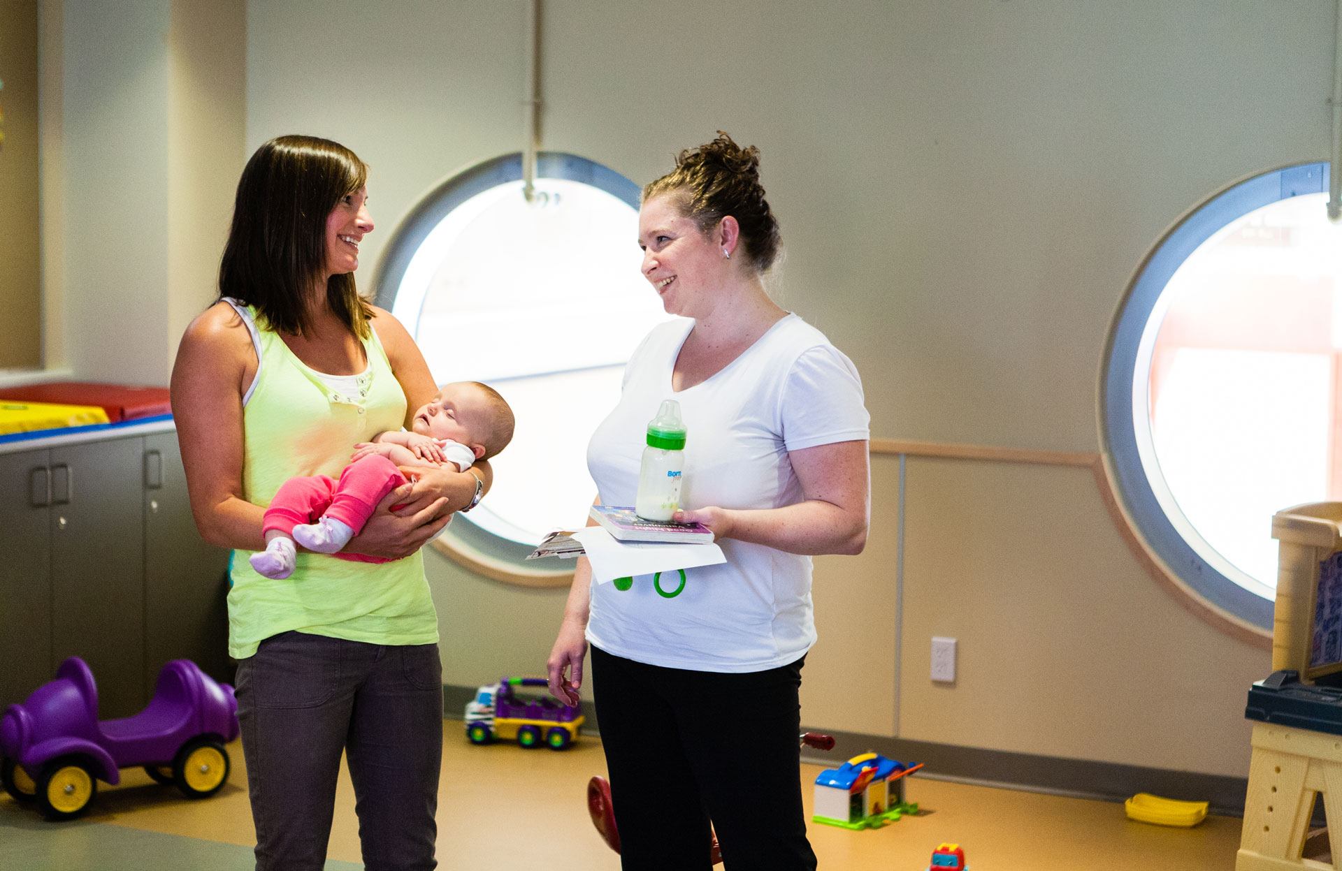 Nobodys Perfect Parenting mom, baby and friend in child play area