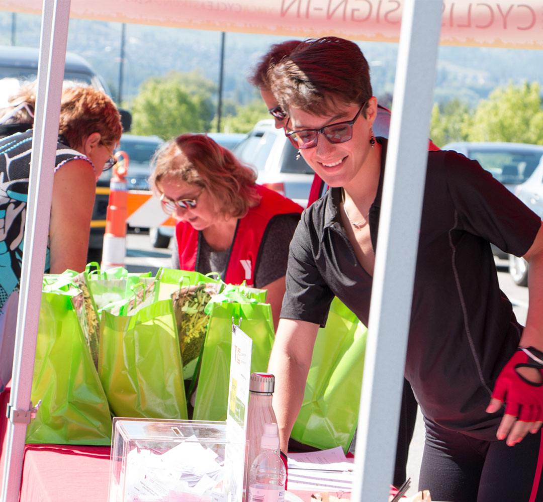 Ways to Give - CfSK sign-in 2017 (teaser) sign-in station at 2017 cycling fundraising event