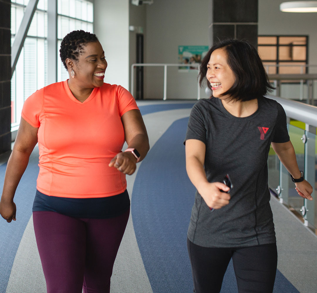 Small Steps for Big Changes (teaser) Coach and participant happily using walking track together