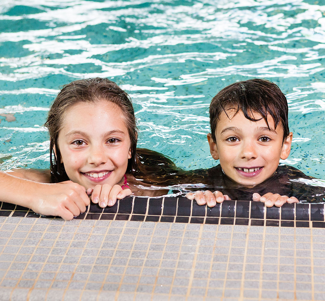 Okanagan Swims 0516 (teaser) two happy children in a pool