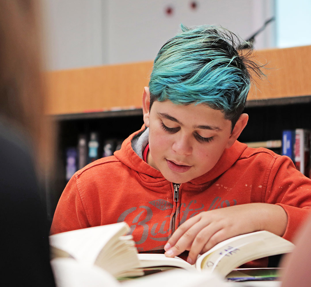 Back on Track 1469 (teaser) young person reading a book