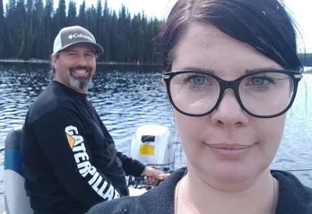 Larissa and her husband fishing