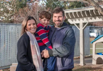 Leonardo and his family smiling 
