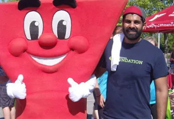 Urban Systems staff with YMCA mascot Spirit