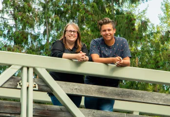 Val on a bridge with her son