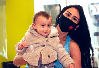 Mariely holding her baby girl