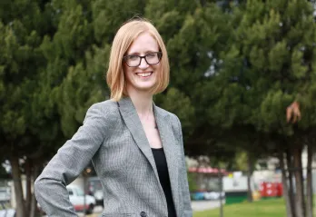 woman in grey blazer