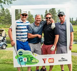 Golfers posing at the tournament