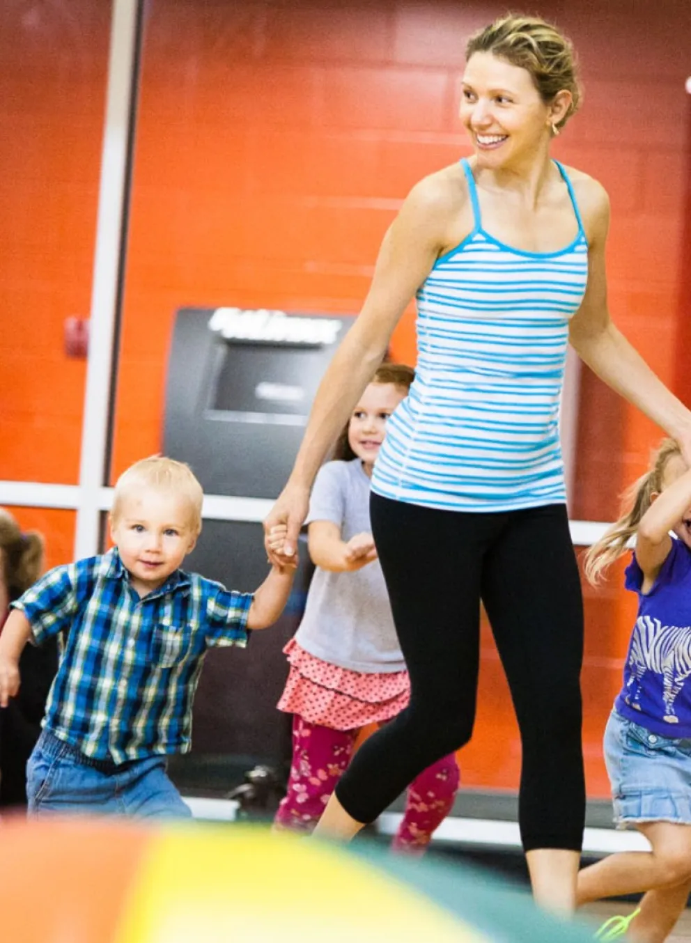 family holding hands smiling