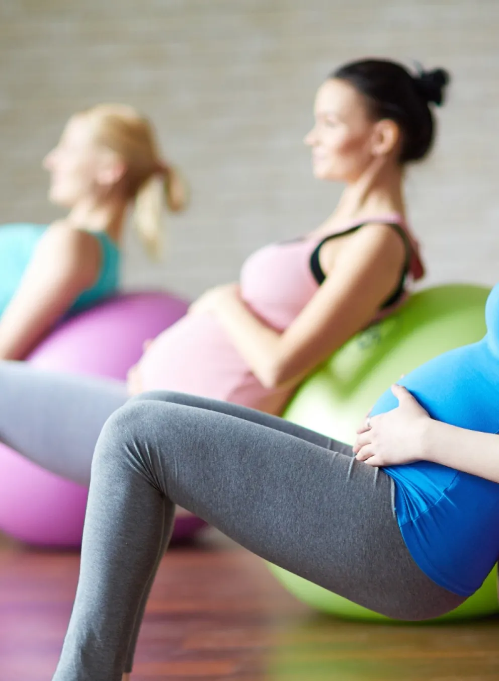 Pregnant women on yoga balls