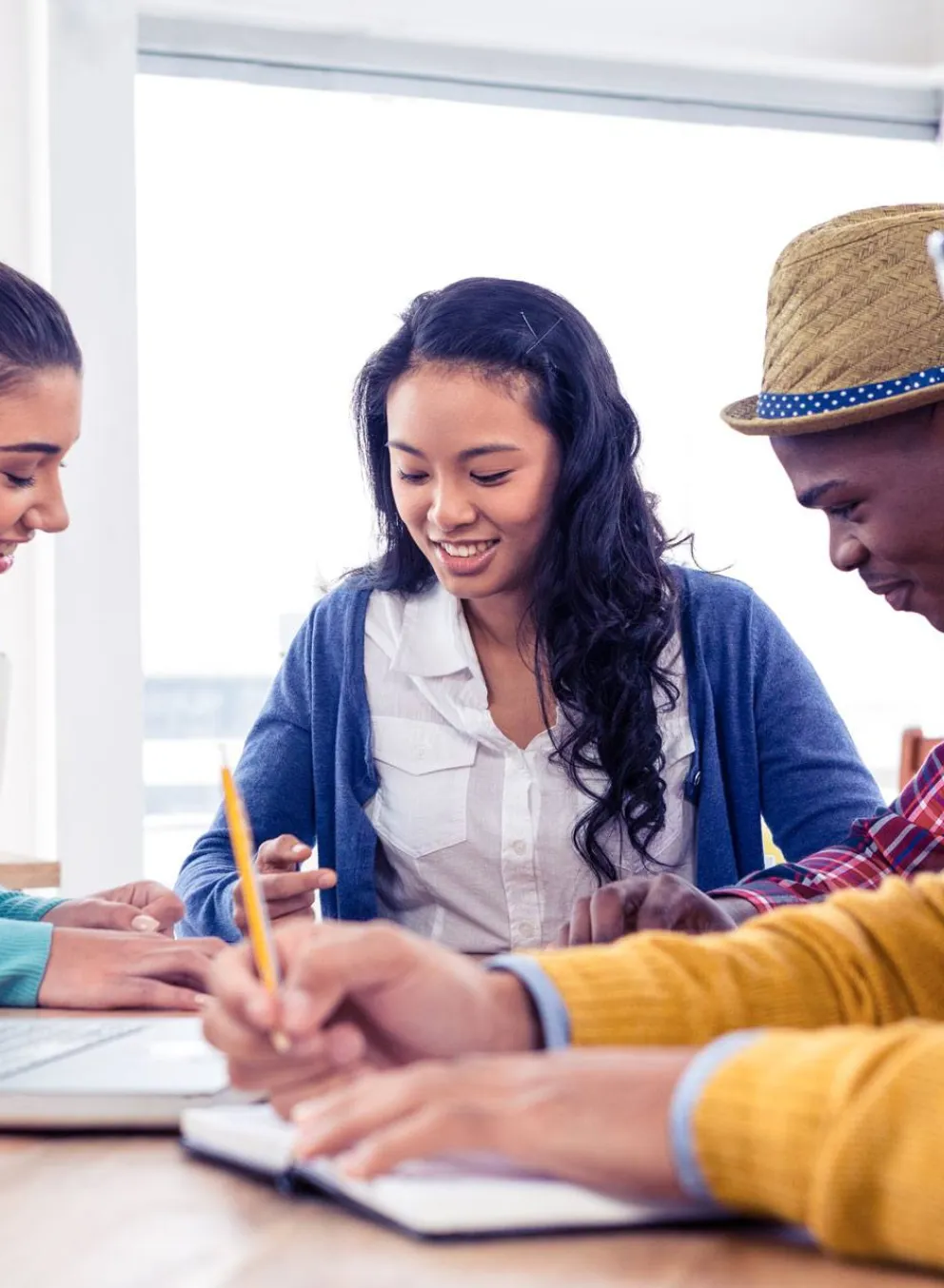 diverse group of young people learning together