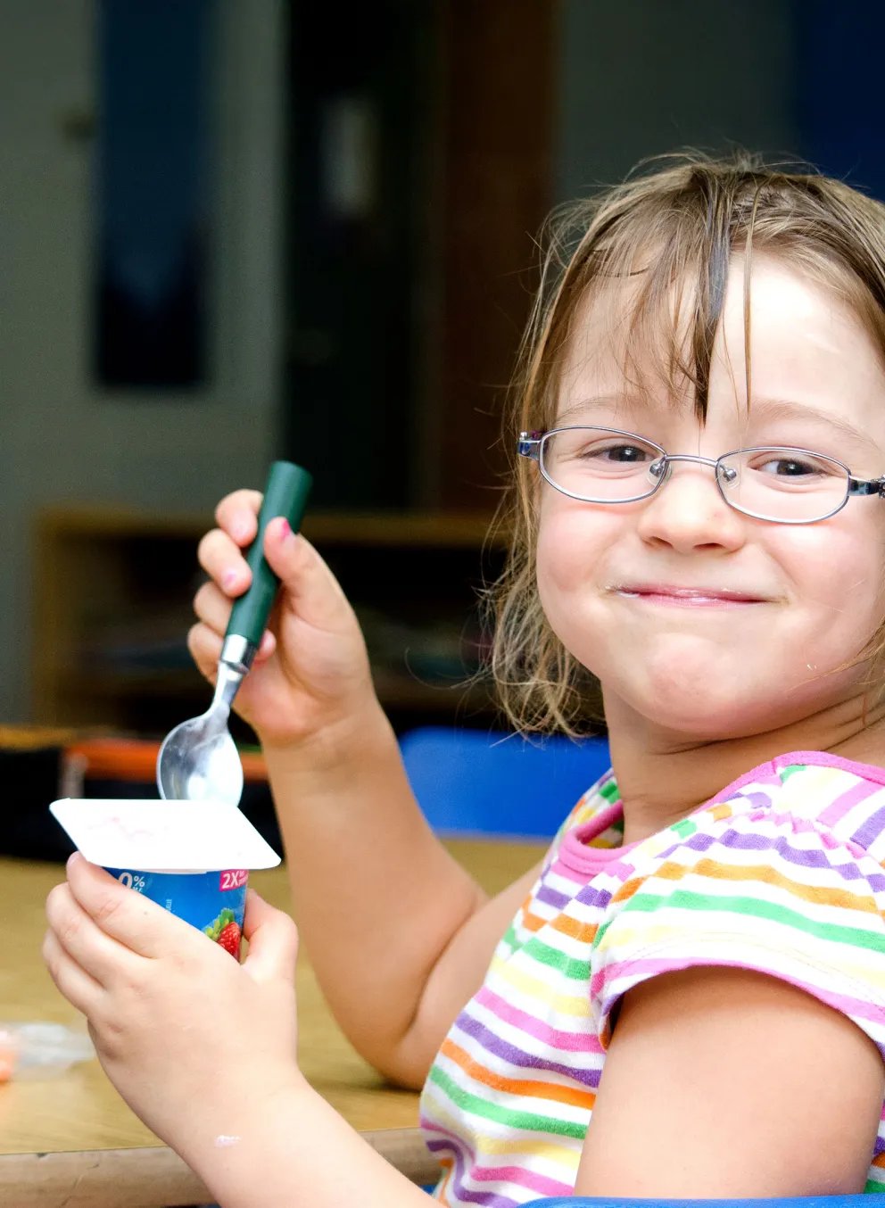 girl eating yogurt