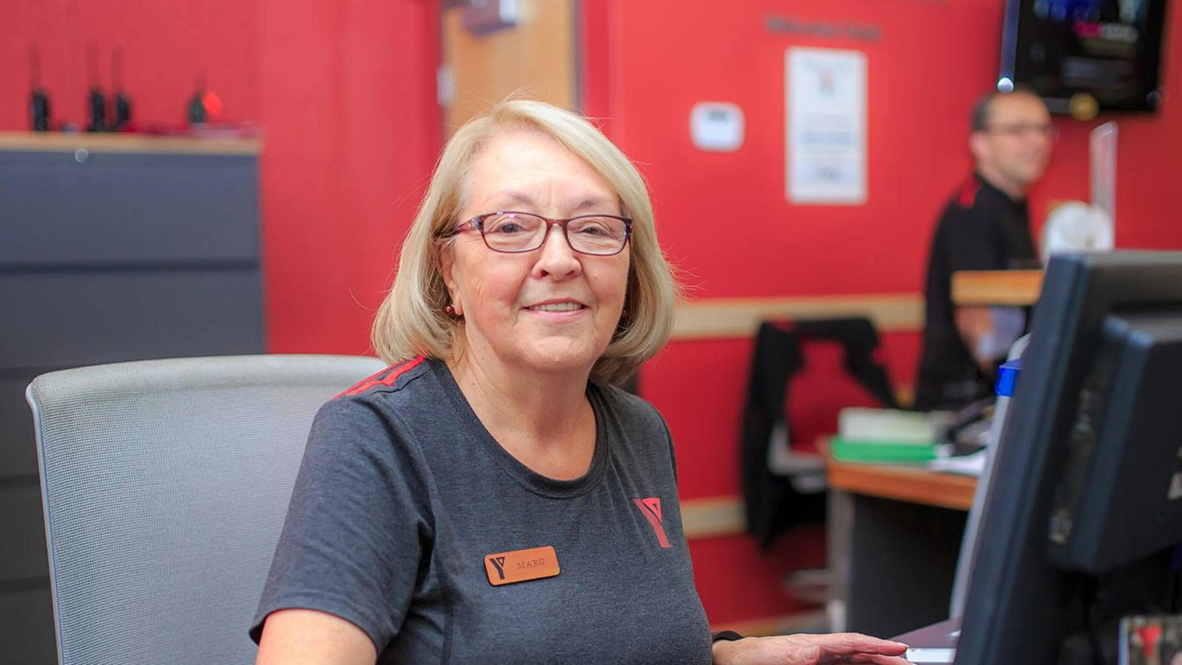 YMCA staff member at computer