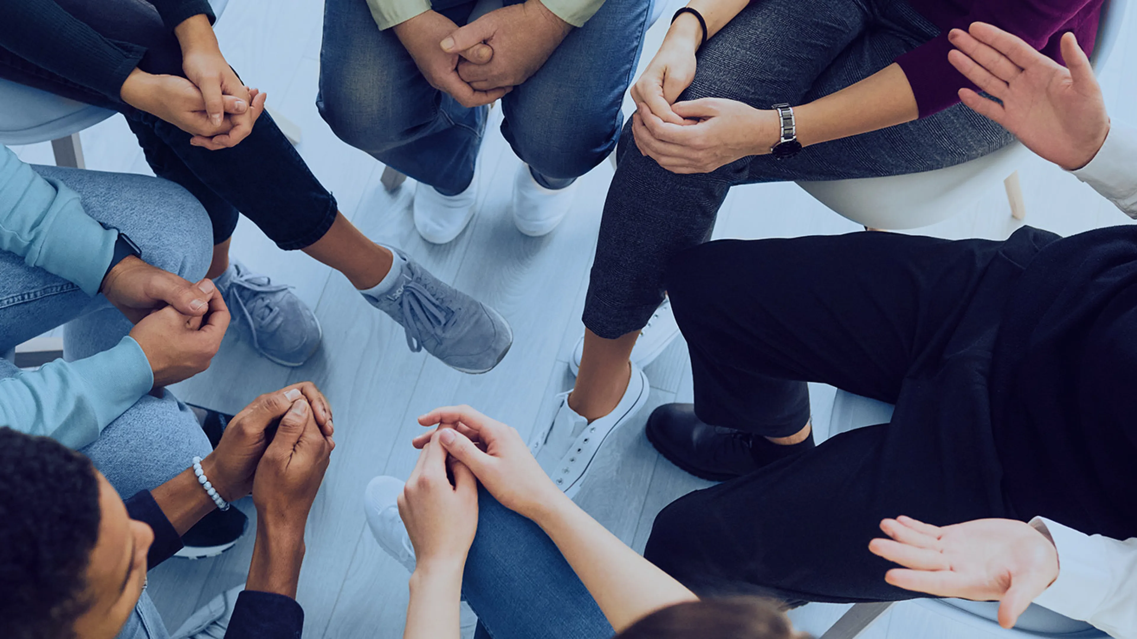 people sitting and chatting in small circle
