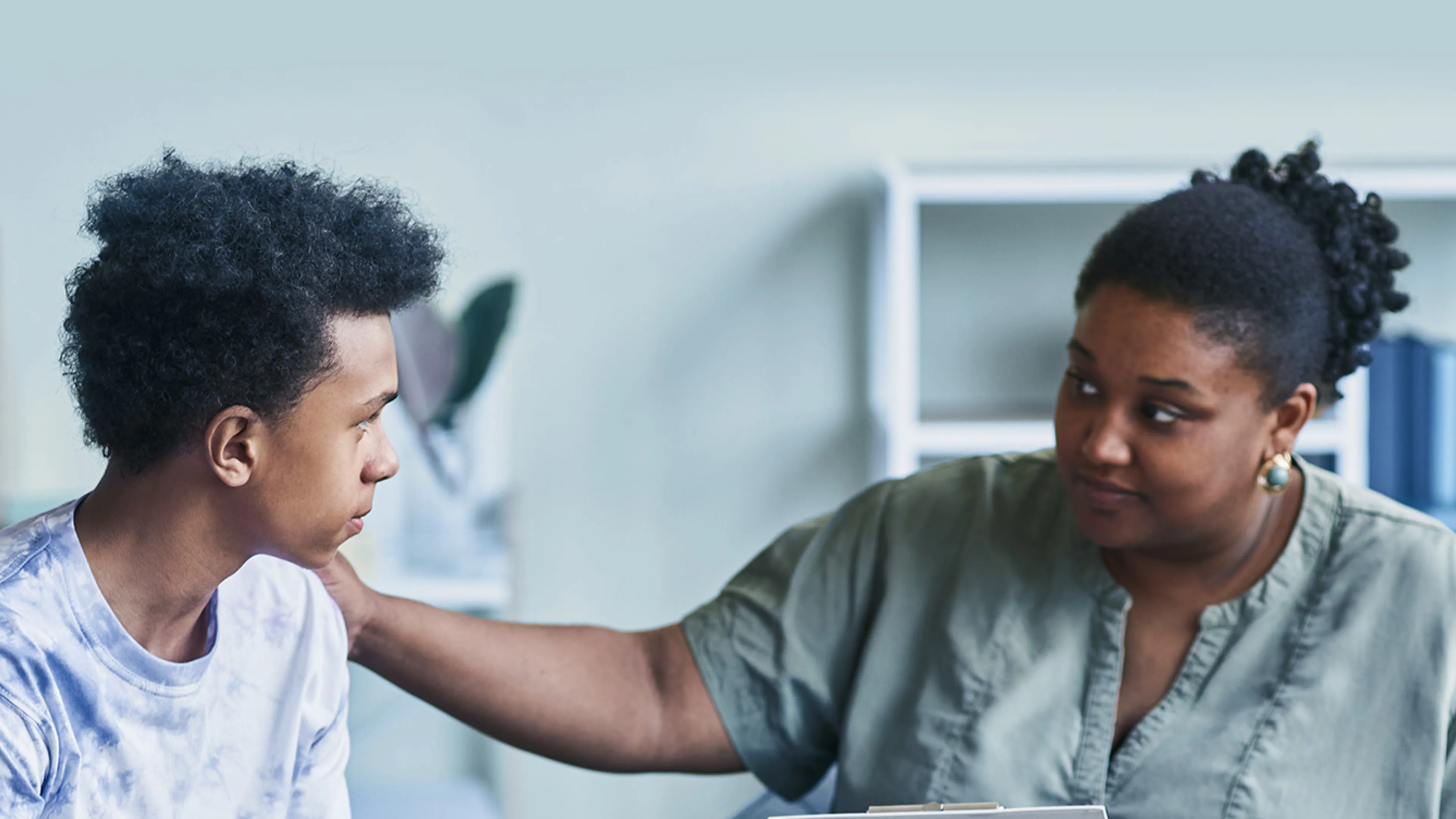 teens get support from adult program facilitator