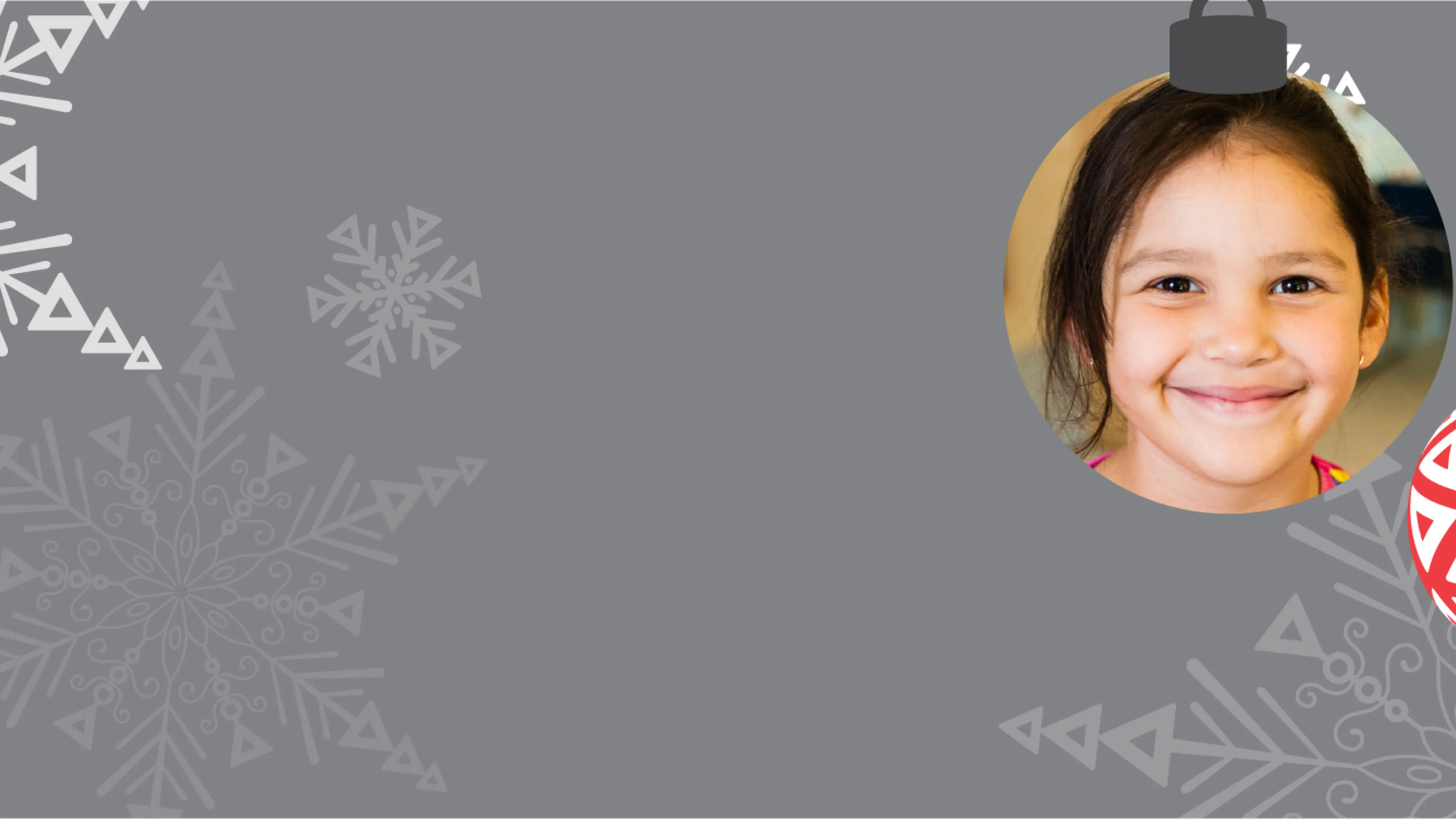 snowflakes, ornaments, and photo of child smiling