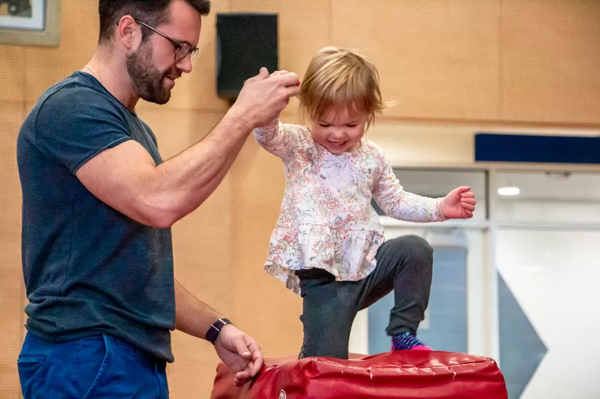 Paul playing with his daughter