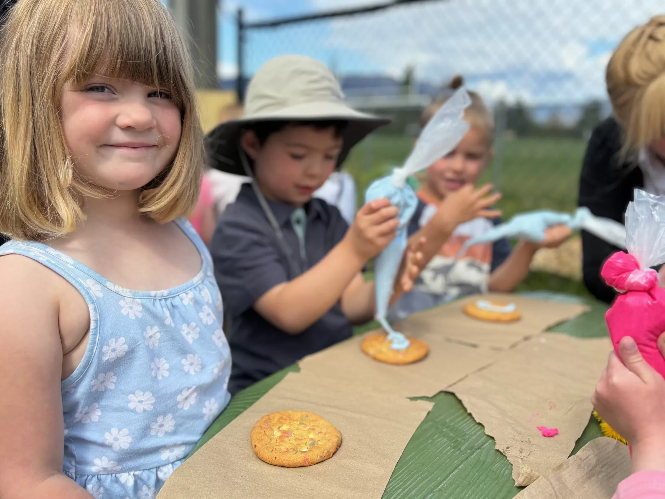 Local children enjoy decorating cookies