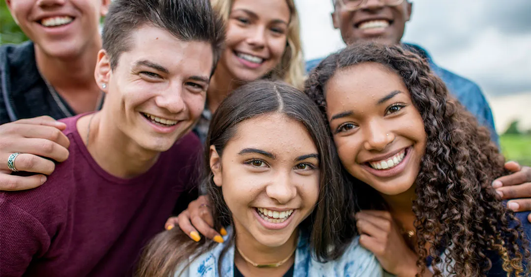 diverse group of young people smiling