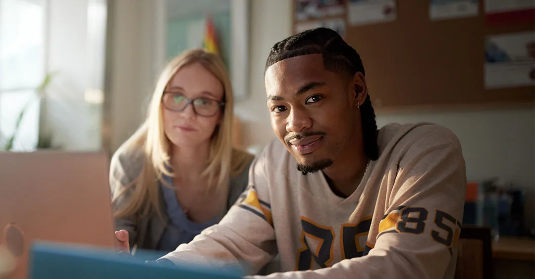 confident and hopeful young man in employment program