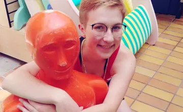 Sophie posing with a mannequin 