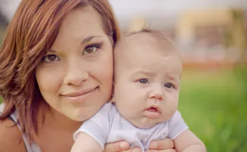 mother holding her baby