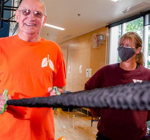 Specialty health programs Bob working out with a trainer