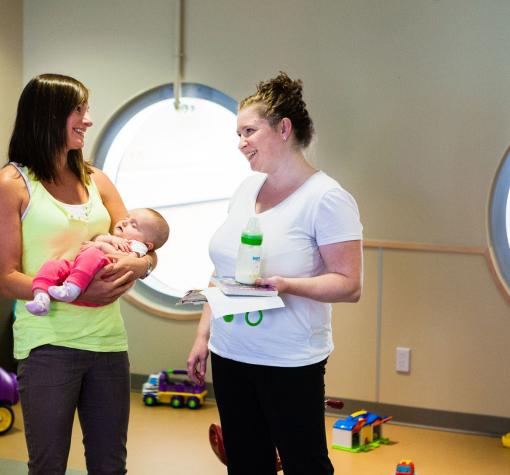 Nobodys Perfect Parenting mom, baby and friend in child play area