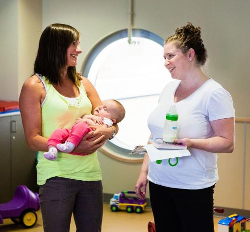 Nobodys Perfect Parenting mom, baby and friend in child play area