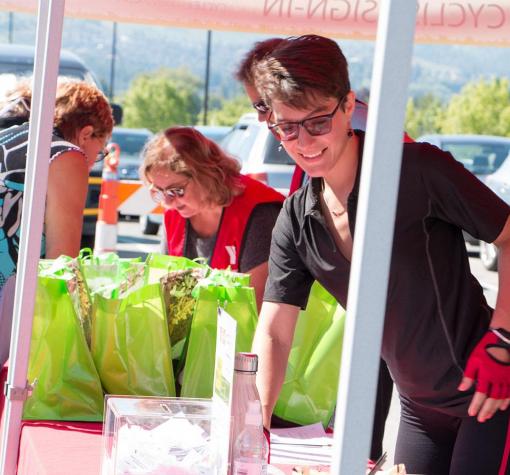 Ways to Give - CfSK sign-in 2017 (teaser) sign-in station at 2017 cycling fundraising event