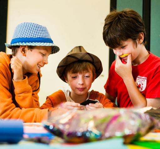 Generation Health three boys doing crafts