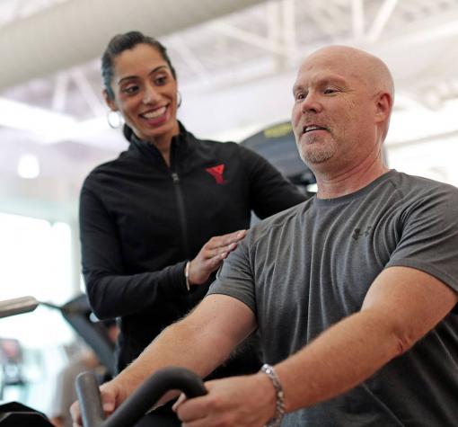 Personalized Fitness Coaching (teaser) YMCA coach encourages proper shoulder position